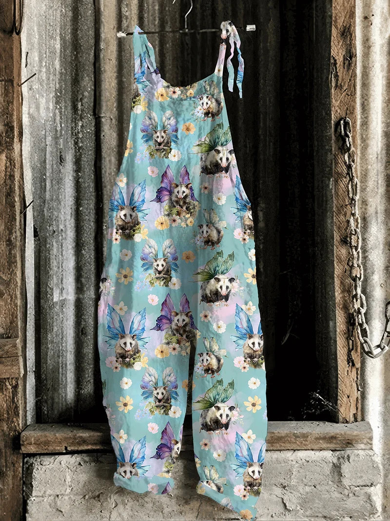 Lightweight artisanal jumpsuit in aqua whimsical possum fairy print