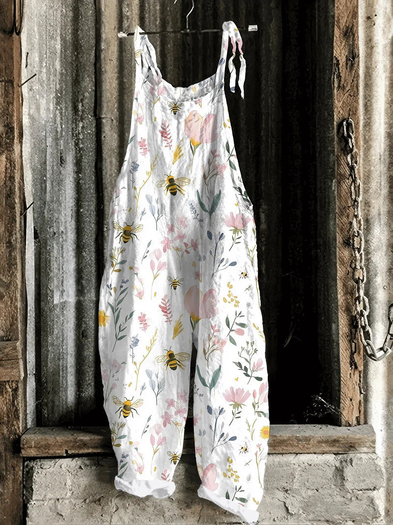 Lightweight artisanal jumpsuit in white bee & wildflower meadow print