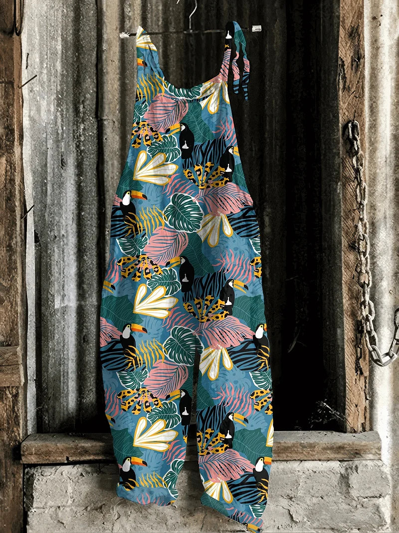 Lightweight artisanal jumpsuit in tropical jungle print with toucans & wildcats