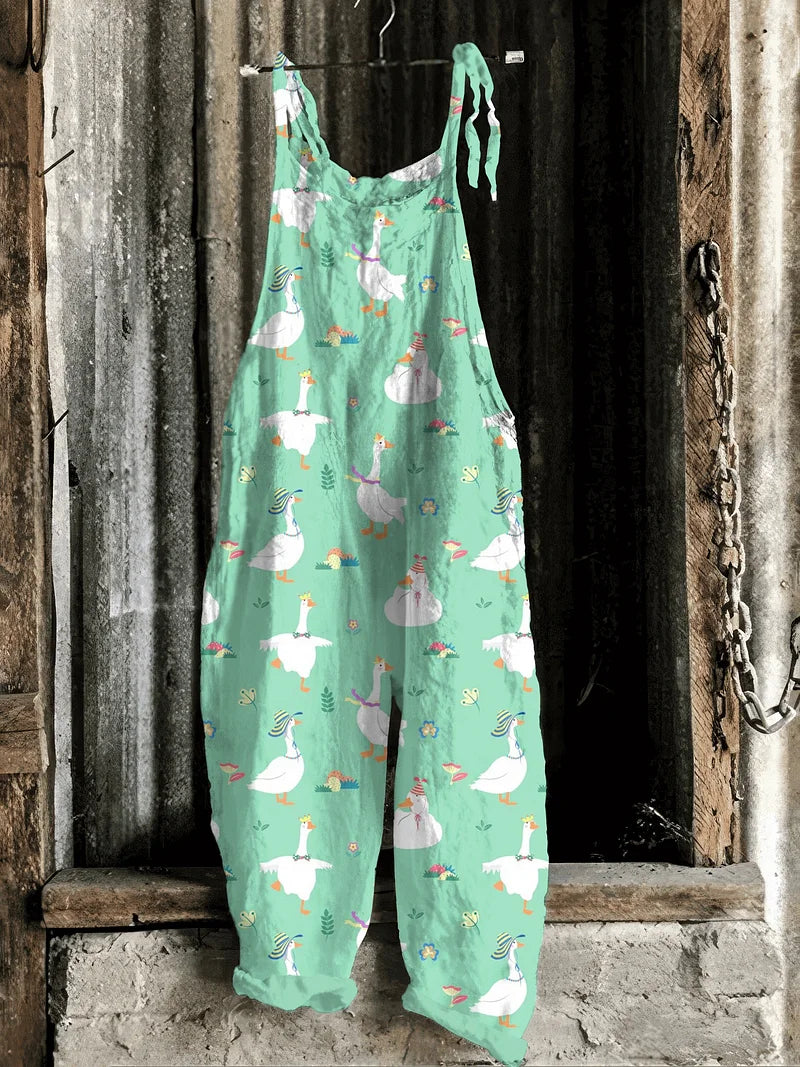 Lightweight artisanal jumpsuit in mint green with whimsical goose & meadow print