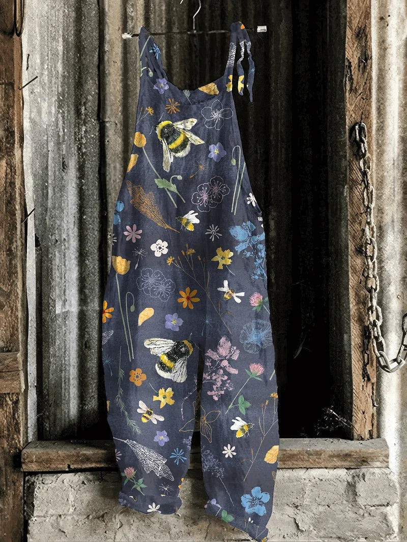Lightweight artisanal jumpsuit in navy with bees & wildflowers print